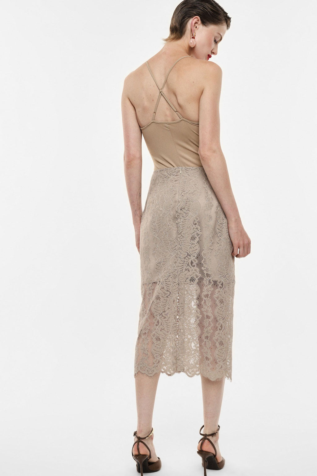 Gonna midi in pizzo con spacco laterale