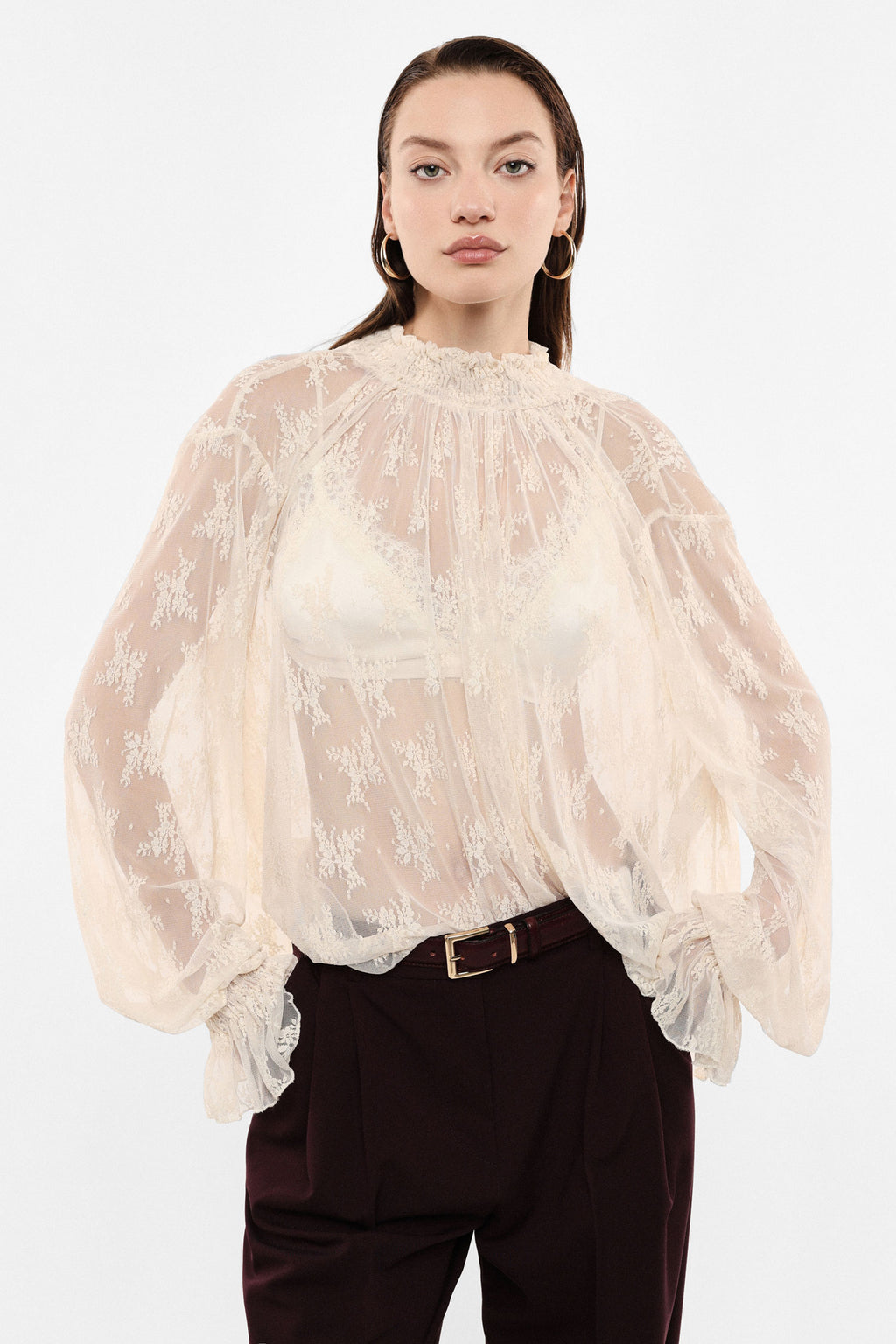 Top con maniche lunghe in tulle stampato