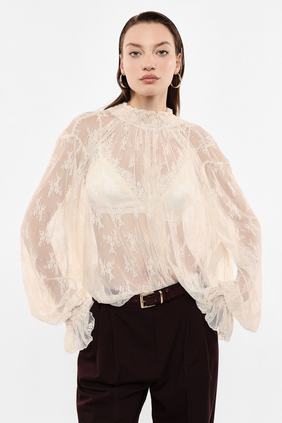 Top con maniche lunghe in tulle stampato