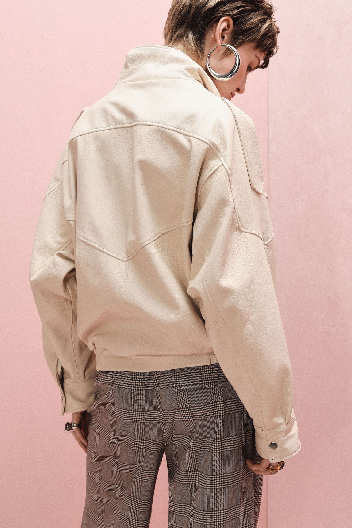 Giacca in pelle con zip e collo alto