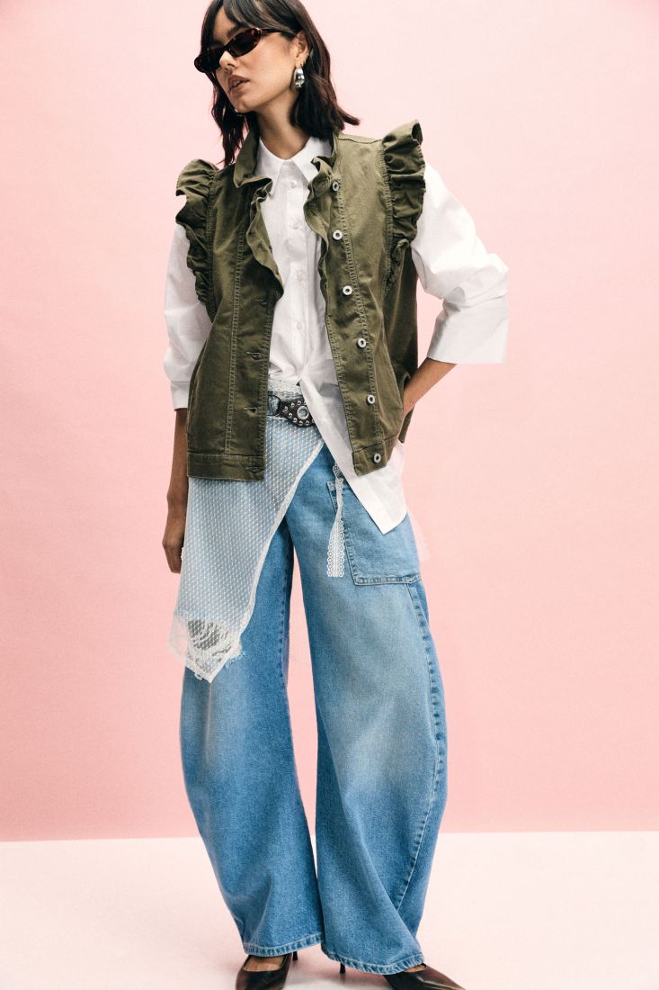 Jeans wide leg strappo e tasca applicata