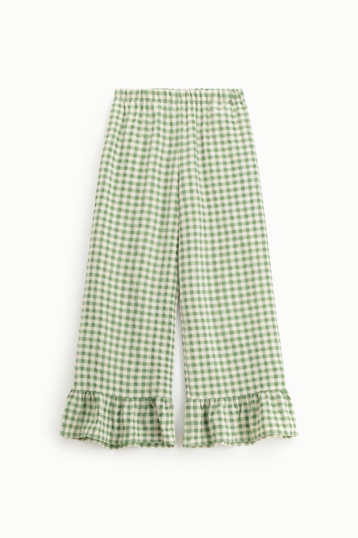 Pantaloni palazzo a quadretti con volant fondo