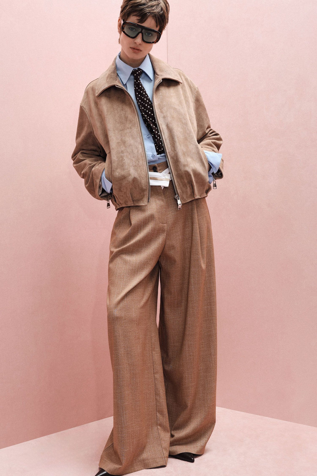 Pantaloni palazzo a vita alta con cintura intrecciata