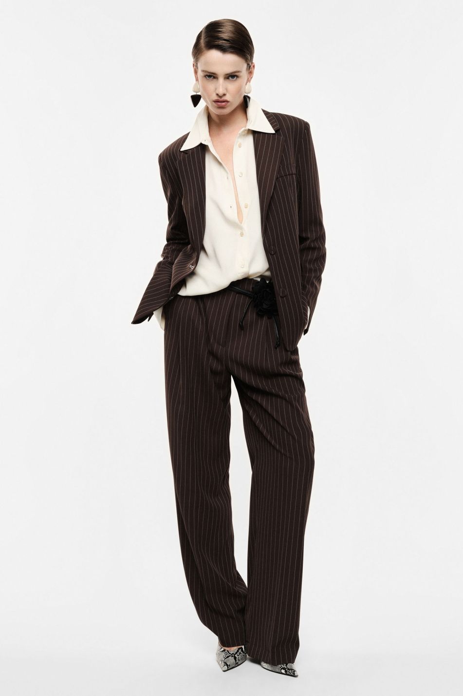 Pantaloni palazzo a righe con cintura fiore