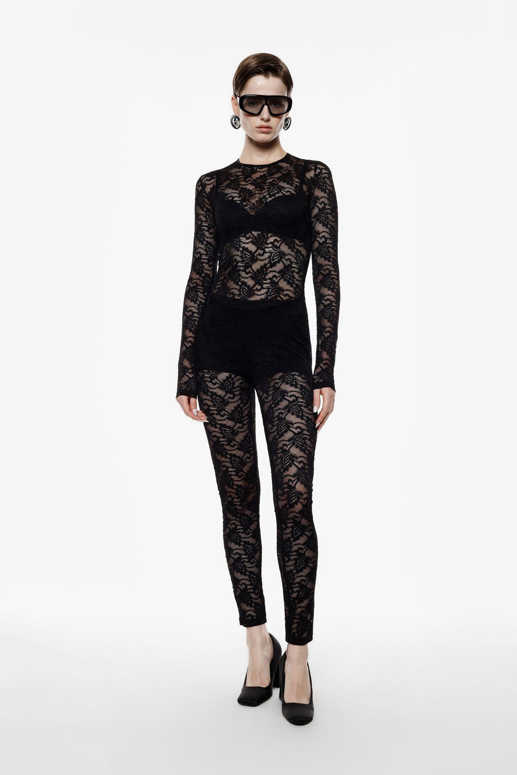 Jumpsuit in pizzo trasparente