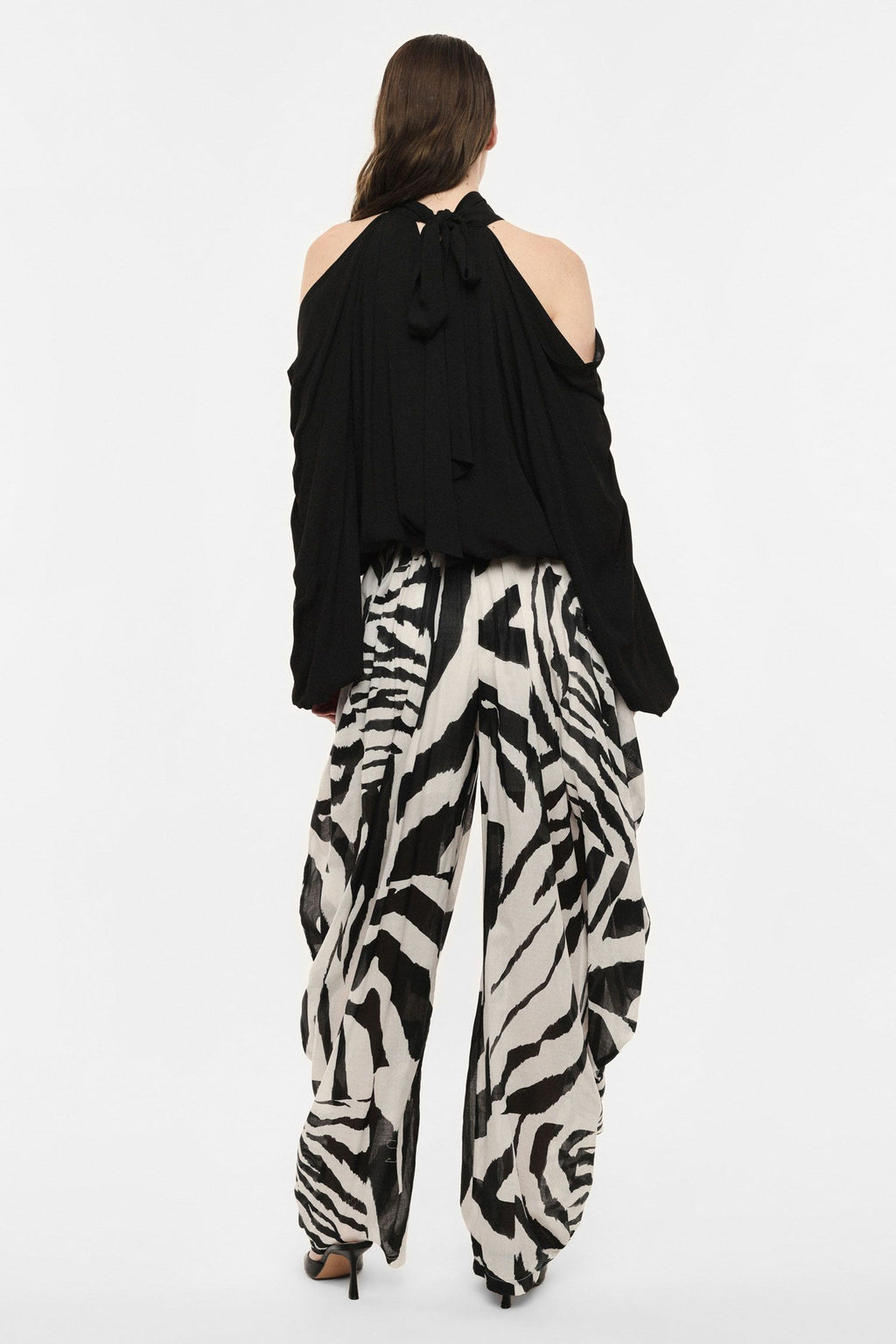 Pantaloni palazzo con stampa e drappeggio