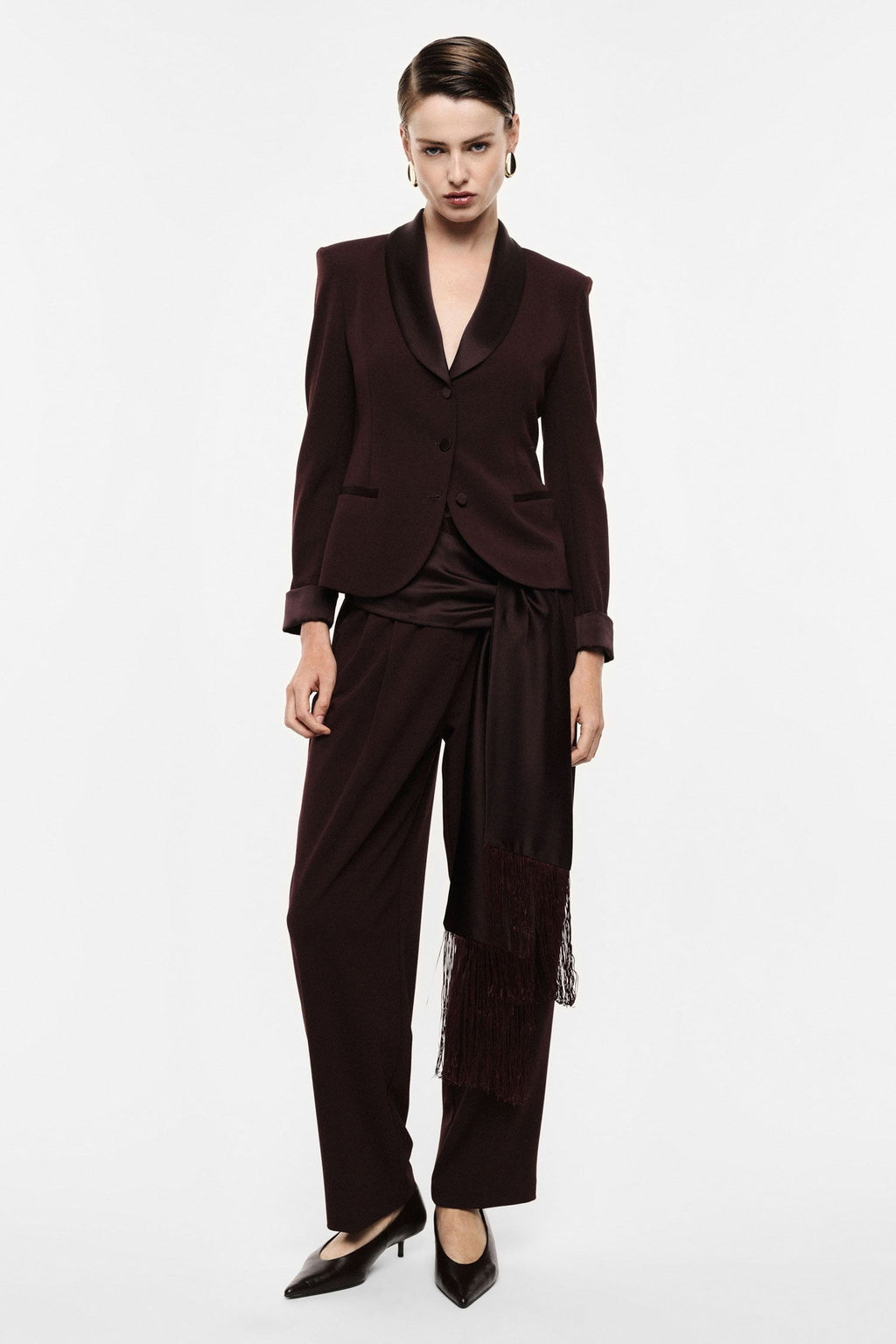 Pantaloni palazzo a vita alta con frange