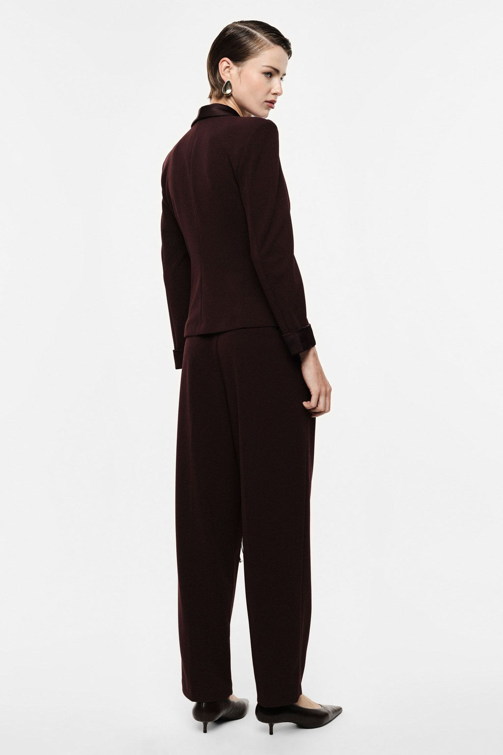 Pantaloni palazzo a vita alta con frange