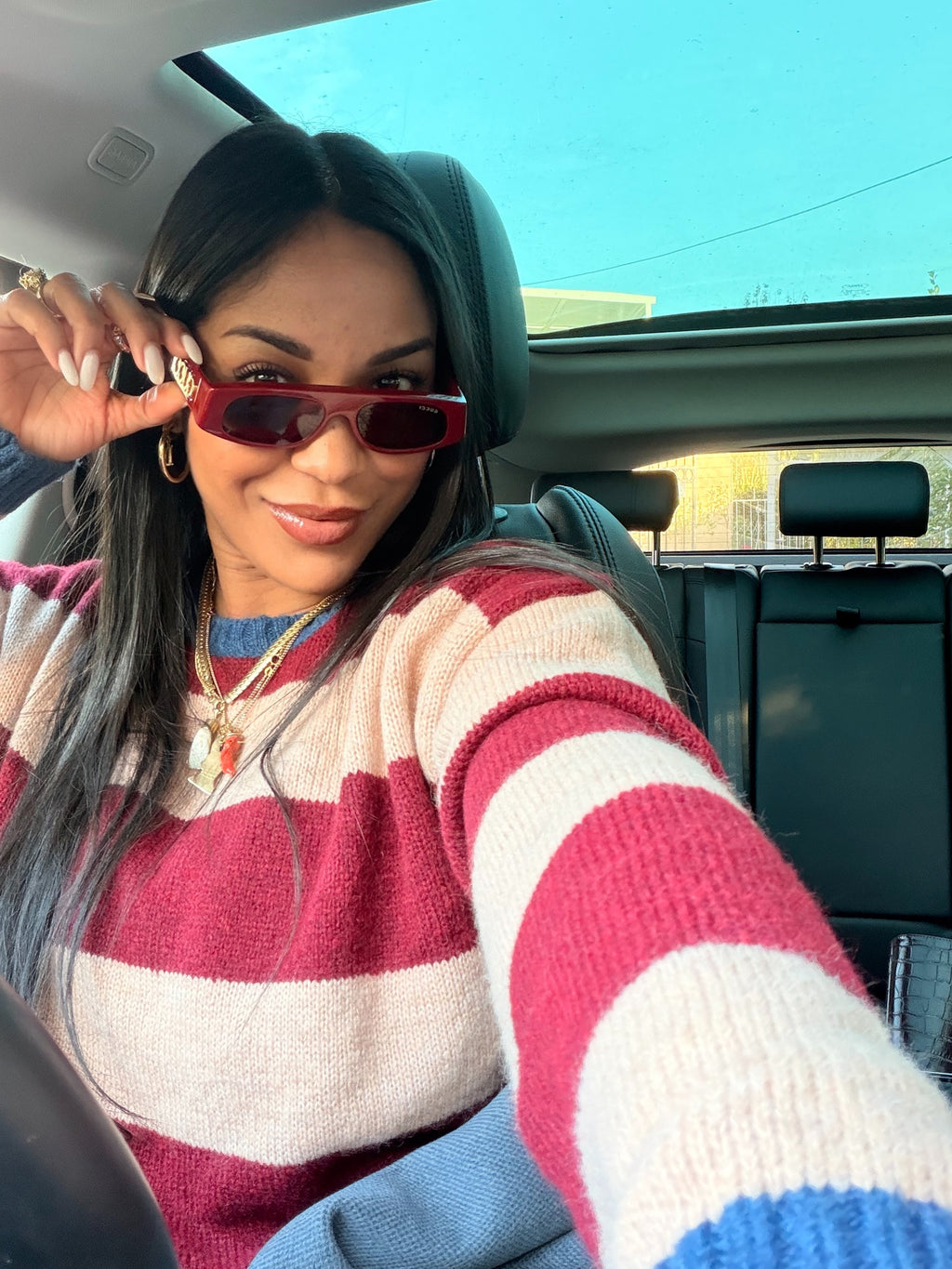 Maglione a righe girocollo