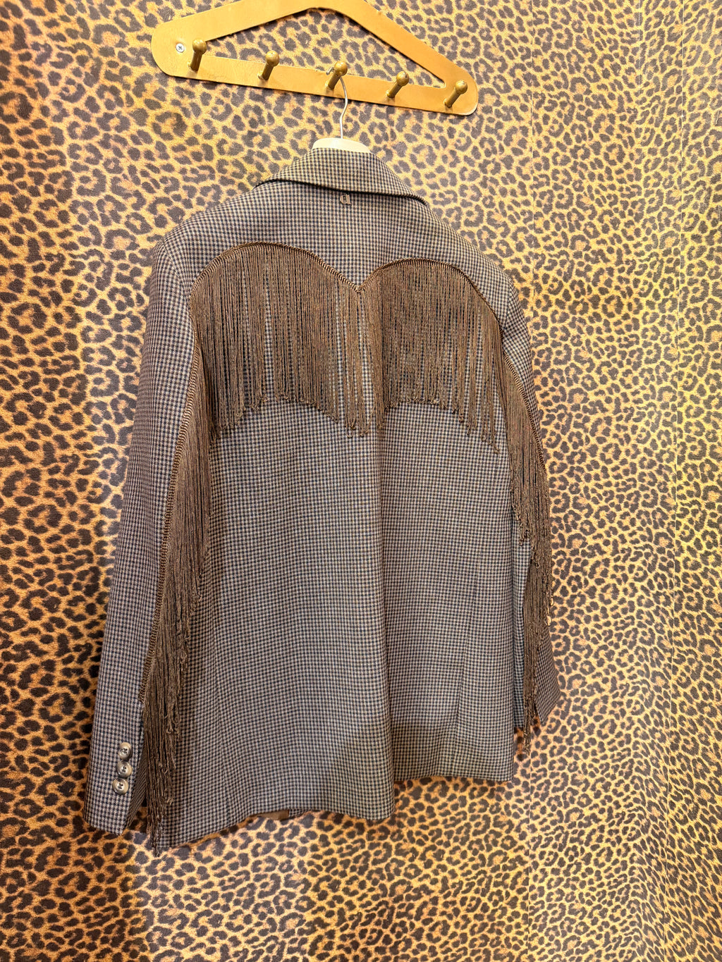 Blazer fantasia micro-check con frange decorative