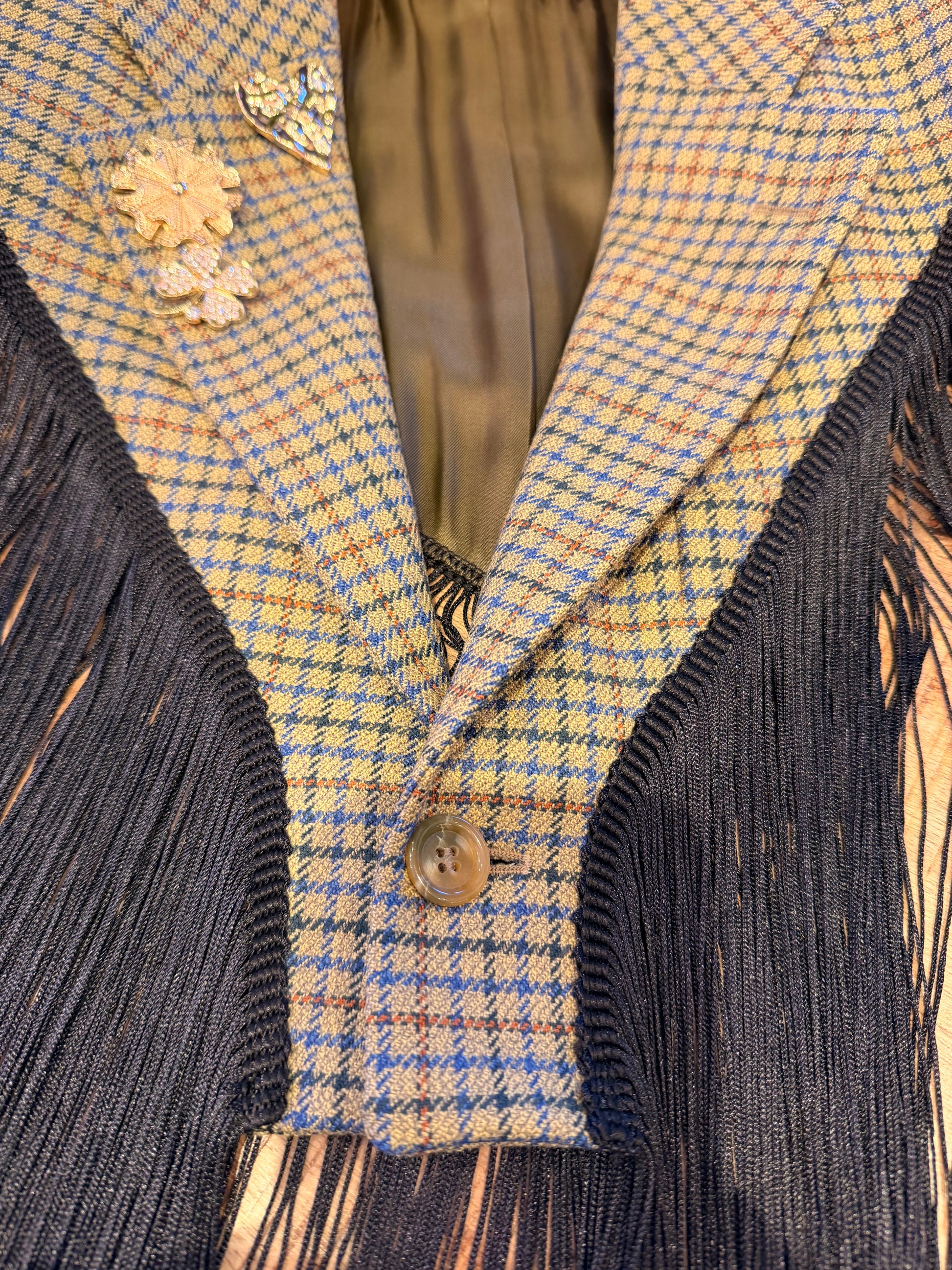 Coprispalle stile blazer check con frange